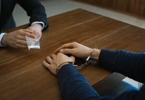 Man arrested during a drug investigation with a drug charges defense attorney San Diego